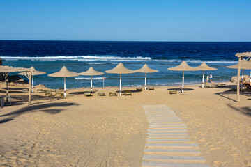 beach with umbrellas