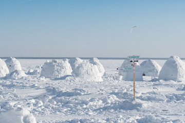 Real snow igloo house in the winter.	