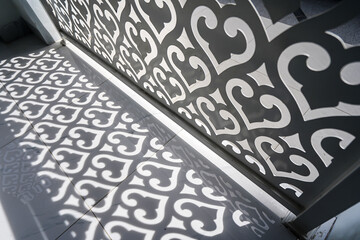 Islamic patterns on modern building. Concept image of traditional design in modern building details.