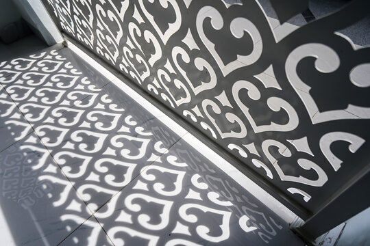 Islamic patterns on modern building. Concept image of traditional design in modern building details.