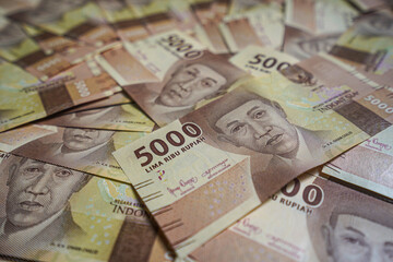 Money background. Cash money with the amount of five thousand rupiah "Rp5.000". The official currency of Indonesia from Bank Indonesia. 