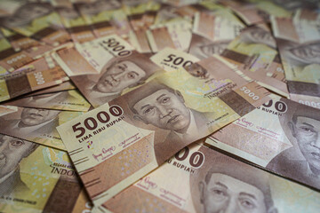 Money background. Cash money with the amount of five thousand rupiah "Rp5.000". The official currency of Indonesia from Bank Indonesia. 