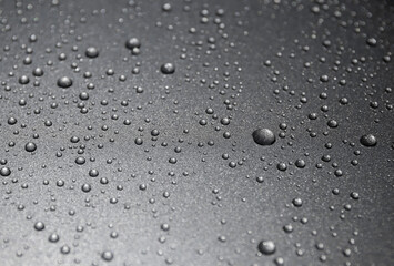  water drops on black background close up