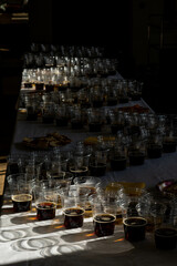 beer in plastic cups in a counter light