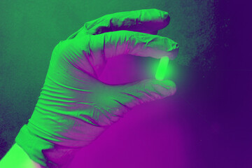 Radioactive pills in hand