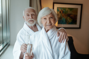 A happy elderly couple feeling good together