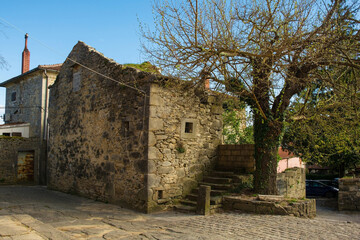 An old derelict residential building in the historic medieval hill village of Buzet in Istria, western Croatia

