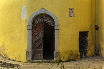 Fototapeta premium The entrance to an historic medieval Renaissance tower in the hill village of Buzet in Istria, western Croatia 