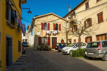 Fototapeta na wymiar An historic residential street in the medieval hill village of Buzet in Istria, western Croatia 