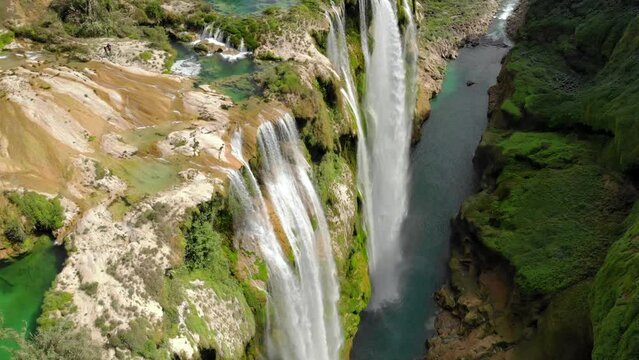 Aerial view of Beautiful Fascinating Tamul Waterfall with turquoise water in San Luis Potosi, Mexico