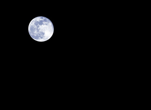Big Blue Moon on the black sky