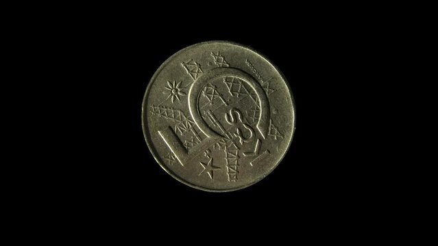 Reverse of Czechoslovakia coin 5 korun 1974 with inscription meaning Czechoslovakia crowns. Isolated in black background.