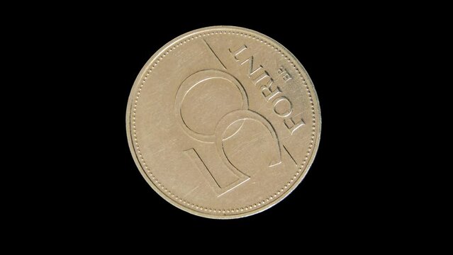 Rotating reverse of Hungary coin 50 forint 1995. Isolated in black background.