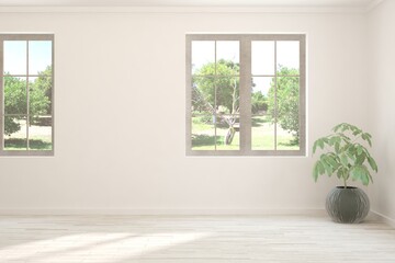 Obraz premium White living room with sofa and summer landscape in window. Scandinavian interior design. 3D illustration