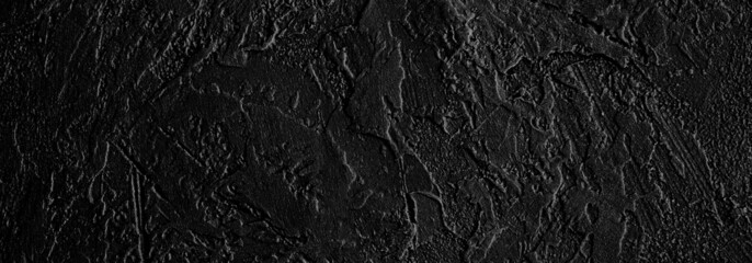 Black stone banner background. Black grunge background.Graphite texture. Copy space