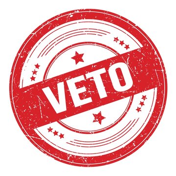 VETO text on red round grungy stamp.