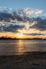Fototapeta premium colorful sunset on the Neva River with a light path on the water at the end of a summer day