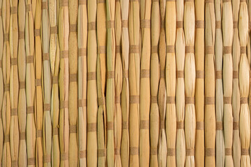 Bamboo grass rugs or napkin for table, macro close up. View from above.