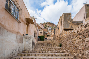 Mardin old town street view with historical buildings,  cityscape of Mardin in Turkey