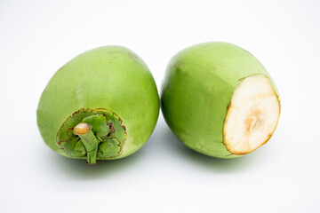 two green coconut over on white background