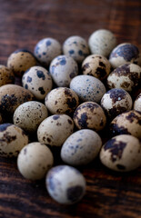 quail eggs on wooden background