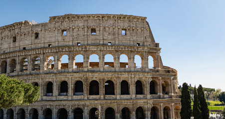 Obraz premium Great Roman Colosseum, Coliseum, Colosseo, also known as the Flavian Amphitheatre. Famous world landmark. Scenic urban landscape. Rome, Italy