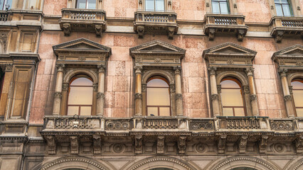 Fototapeta na wymiar detail of the facade of a building in Milano