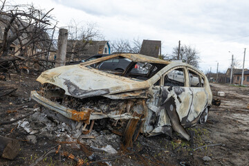 War between Russia and Ukraine. Burnt out car