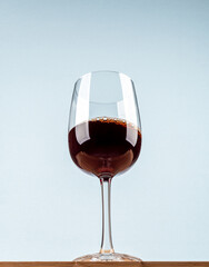 Top view of beer on red wine on wooden surface.