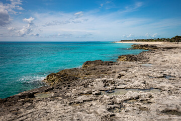Fototapeta na wymiar Imprints on rocks on the coastline of tropical island