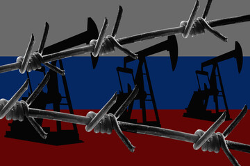 Conceptual image of embargo on russian oil. Barbed wire on the background of the flag of Russia and...