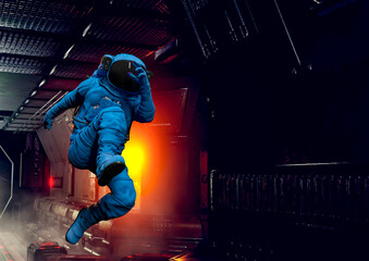 astronaut is jumping on the corridor in sci-fi spaceship background with copy space