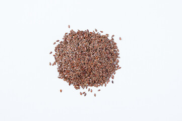 Heap flax seed. White background.
