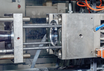 Automated press for the production of lampshades. Production background. Close.