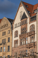 Beautiful traditional medieval buildings along the picturesque river Rhine promenade at sunset. DUSSELDORF, GERMANY.
