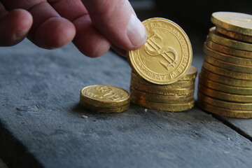Profit growth, business concept. Chart profit from gold coins.