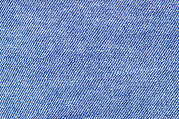 Blue denim seamless background with top view. Blue denim with free space for text and advertising. Textile production of coarse fabric