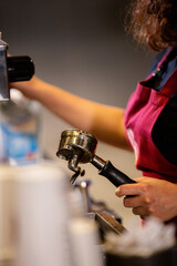 female barista working in cafe