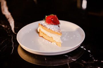 barista serving cake, cake in cafe