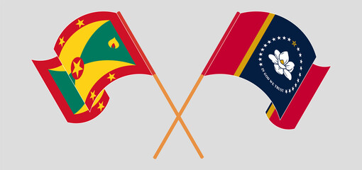 Crossed and waving flags of Grenada and The State of Mississippi