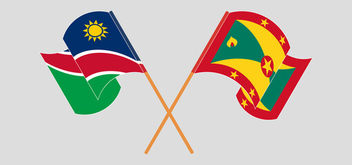 Crossed and waving flags of Namibia and Grenada