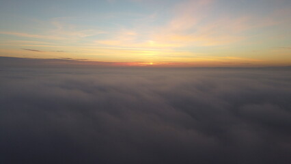 Fototapeta Wschód słońca w chmurach obraz