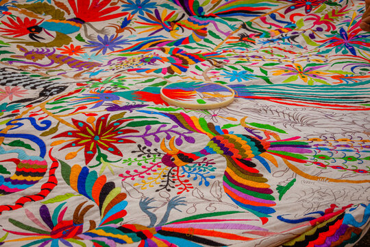Wide Shot of a Tenango, one of the traditional fabrics of Mexico, in the process of embroidery