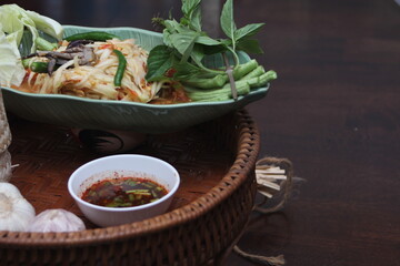 Popular Thai food called "Papaya Salad" or what Thai people call "Somtumpoo".