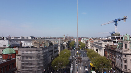 Fototapeta na wymiar Famous O Connell Street with Spire in Dublin from above - aerial view by drone