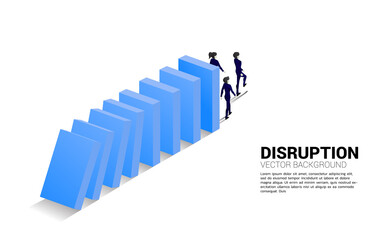 Silhouette of businessman and businesswoman walking from the end of domino collapse. Concept of business industry disrupt