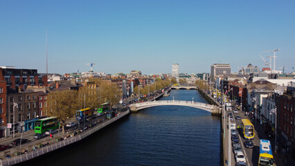 Fototapeta na wymiar Famous Ha Penny Bridge in Dublin from above - drone footage