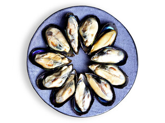 Close up of a plate with freshly mussels on white background.