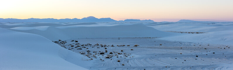 Panorama of white sand dunes at sunset in White Sands National park