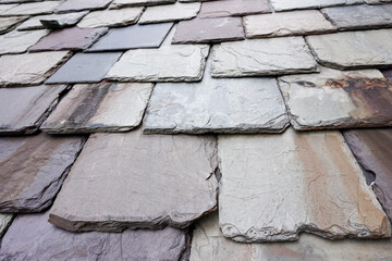 Weathered Slate Roof Tiles. Slate is a traditional roofing material with renowned durability. 